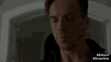 a person is holding a cell phone with the words billions showtime written on the bottom