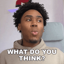 a man making a funny face with the words what do you think