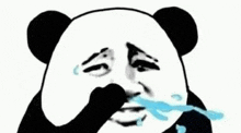 a panda bear is covering its face with its hand while crying .