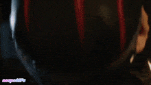 a close up of a woman 's face with the words aespagifs on the bottom left