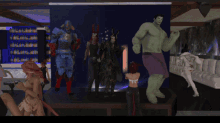 a group of people are gathered around a hulk statue