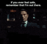 a close up of a man in a suit and tie with a quote .