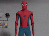 a 3d model of a spiderman standing in front of a checkered board