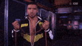 a man in a black jacket with the word rage on the front