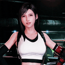a woman in a white tank top and black gloves is standing in a dark room