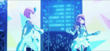 two anime girls are dancing on a stage in front of a blue background