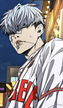 a man with a bandage on his face is wearing a white shirt with the letter e on the front