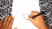 a person is drawing with a stabilo cappa marker