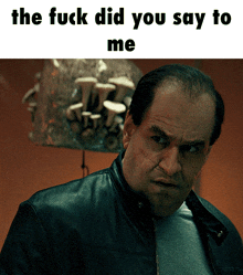 a picture of a man with the words the fuck did you say to me above him