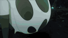 a cartoon drawing of a white object with black circles on it