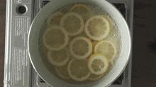 simmering the lemon two plaid aprons boiling the lemon cooking the lemon