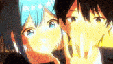 a boy and a girl are standing next to each other and the girl has blue hair .