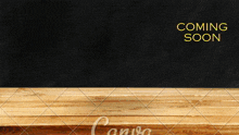 a wooden table with the words coming soon written on it
