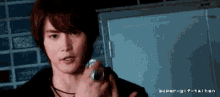 a gif of a man holding a can with super-gif-tainen written on the bottom right