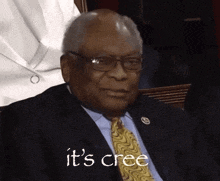 a man in a suit and tie is saying it 's cree