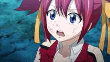 a girl with red hair and blue eyes is wearing a red jacket