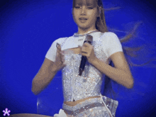 a woman wearing a white shirt that says off on it