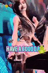 a woman is dancing with the words have a good day on the bottom