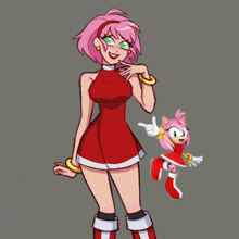 amy rose from sonic the hedgehog is standing next to a smaller amy from sonic the hedgehog