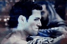 a close up of a man 's face in a boxing ring