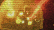 a blurred image of a person 's face is displayed on a yellow and red background
