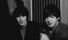 Paul Mccartney George Harrison The Beatles GIF - Paul Mccartney George Harrison The Beatles Wink GIFs