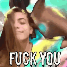 a picture of a woman with the words " fuck you " on the bottom