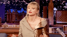 Taylor Swift Shrug GIF