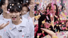 a group of people are sitting in a room with confetti flying around them .