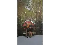 a man and a woman are taking a picture of themselves in a mirror