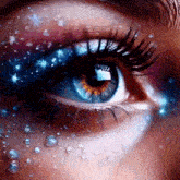 a close up of a woman 's eye with water drops and stars