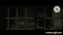 a screenshot of a video game shows a prison cell with blood on the walls
