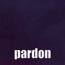 a blurry picture of a person wearing a white hat and headphones with the words `` pardon '' written on it .