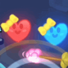 a red and a blue heart with bows on them are floating in the air .