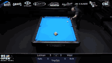a pool table with a blue cloth and the word diamond on it