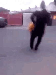 a blurry picture of a person walking on a street