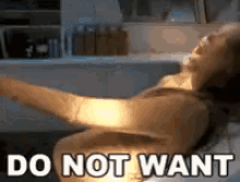 a woman is laying on a bed with her arms outstretched and the words `` do not want '' written above her .