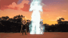 a man and a woman are standing in front of a large statue