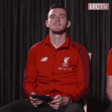 andy robertson liverpool thumbs up
