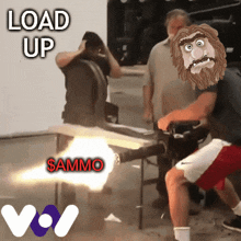 a man with a beard is holding a gun with the words load up $ ammo on it