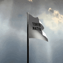 a white flag that says tonkin nation on it