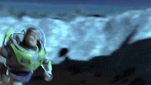 buzz lightyear from toy story is standing in front of a waterfall