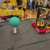 a robot with the number 4466 on the side of it