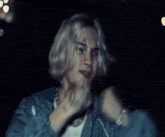 a blurry picture of a person 's face and arms