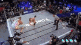 a wrestler in a ring with a sign that says ' got ' on it