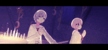 a couple of anime girls standing next to each other in a dark room