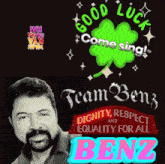 a man with a beard stands in front of a sign that says team benz