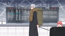a man carrying a large bag stands in front of a sign that says " boarding "
