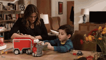 Playing Fire Truck GIF - Playing Fire Truck Mother And Son GIFs