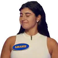 a woman wearing a white tank top with amanee written on it